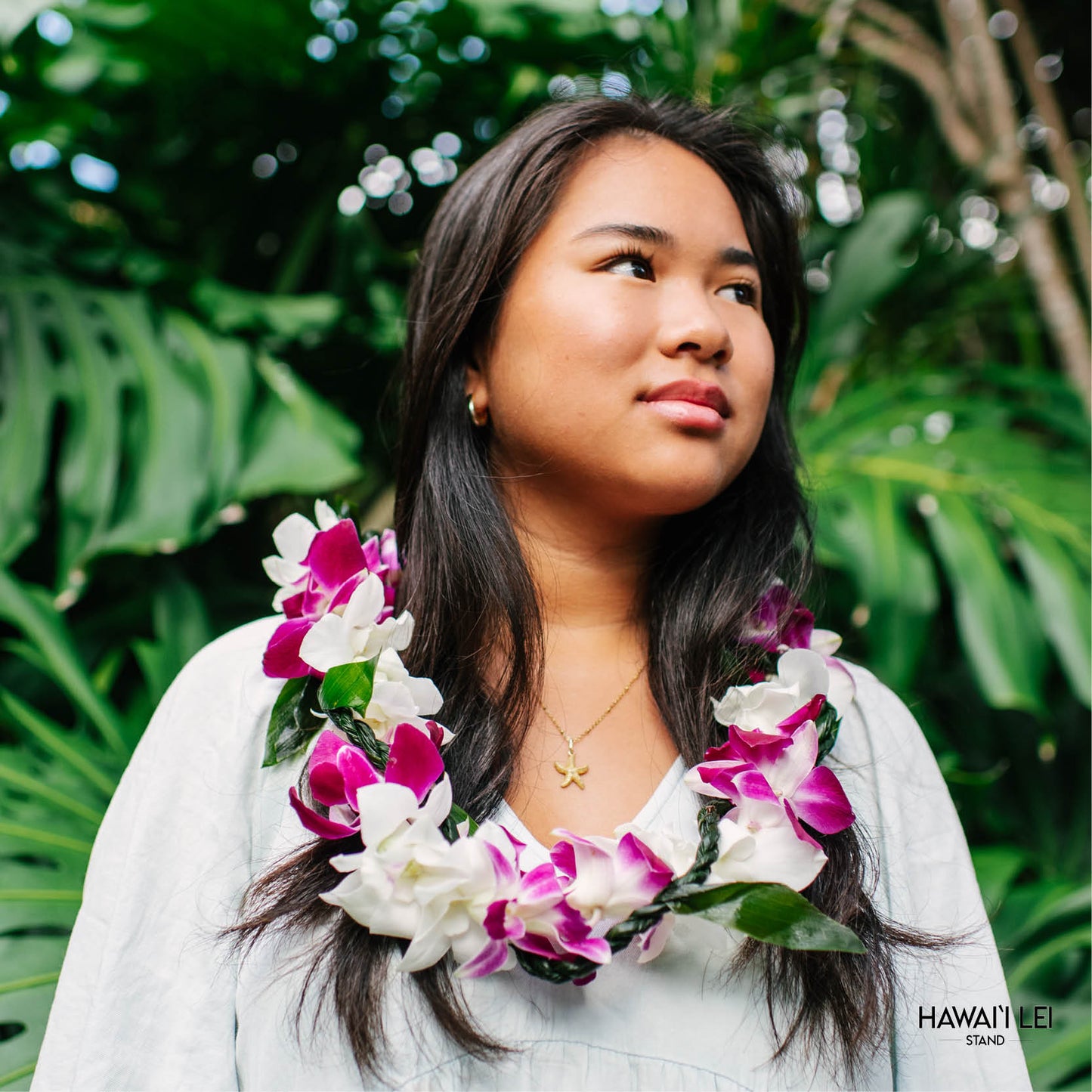 Orchid Wrapped With Ti Leaf Lei (Purple And White)