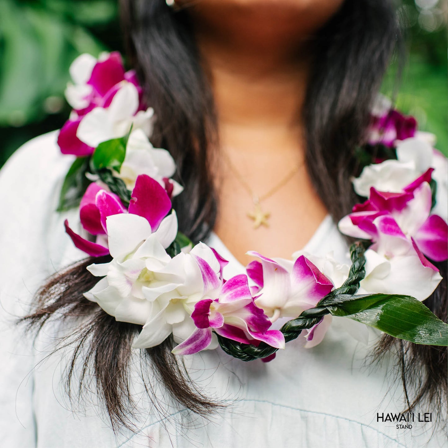 Orchid Wrapped With Ti Leaf Lei (Purple And White)