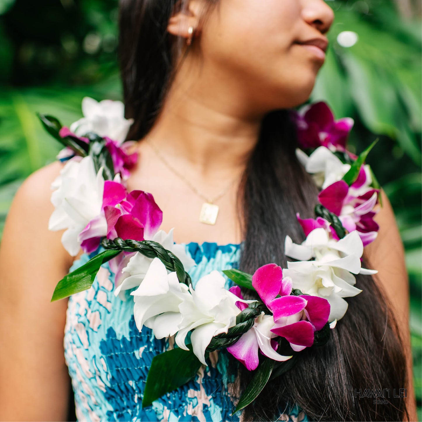 Orchid Wrapped With Ti Leaf Lei (Purple And White)