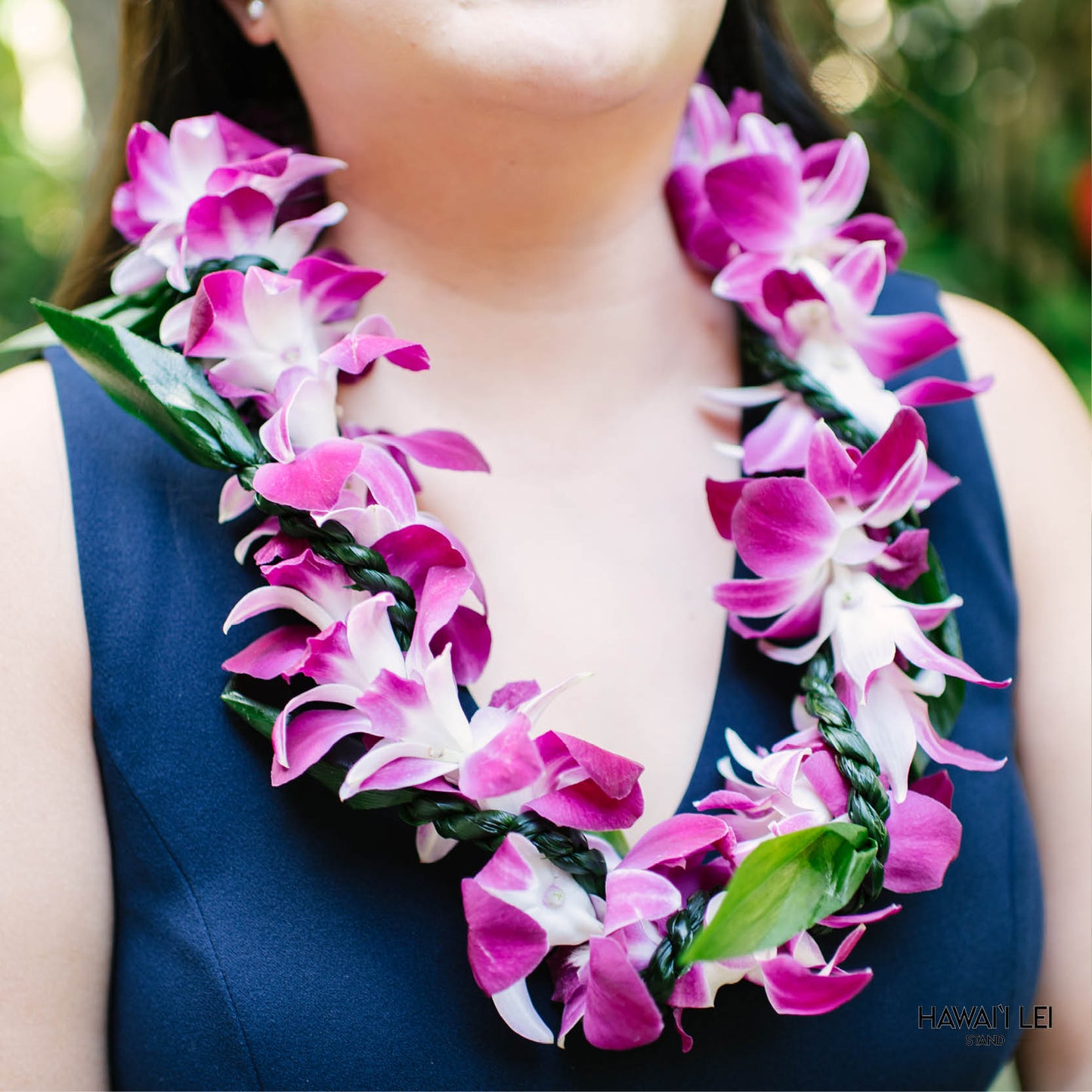Orchid Wrapped With Ti Leaf Lei (Purple)