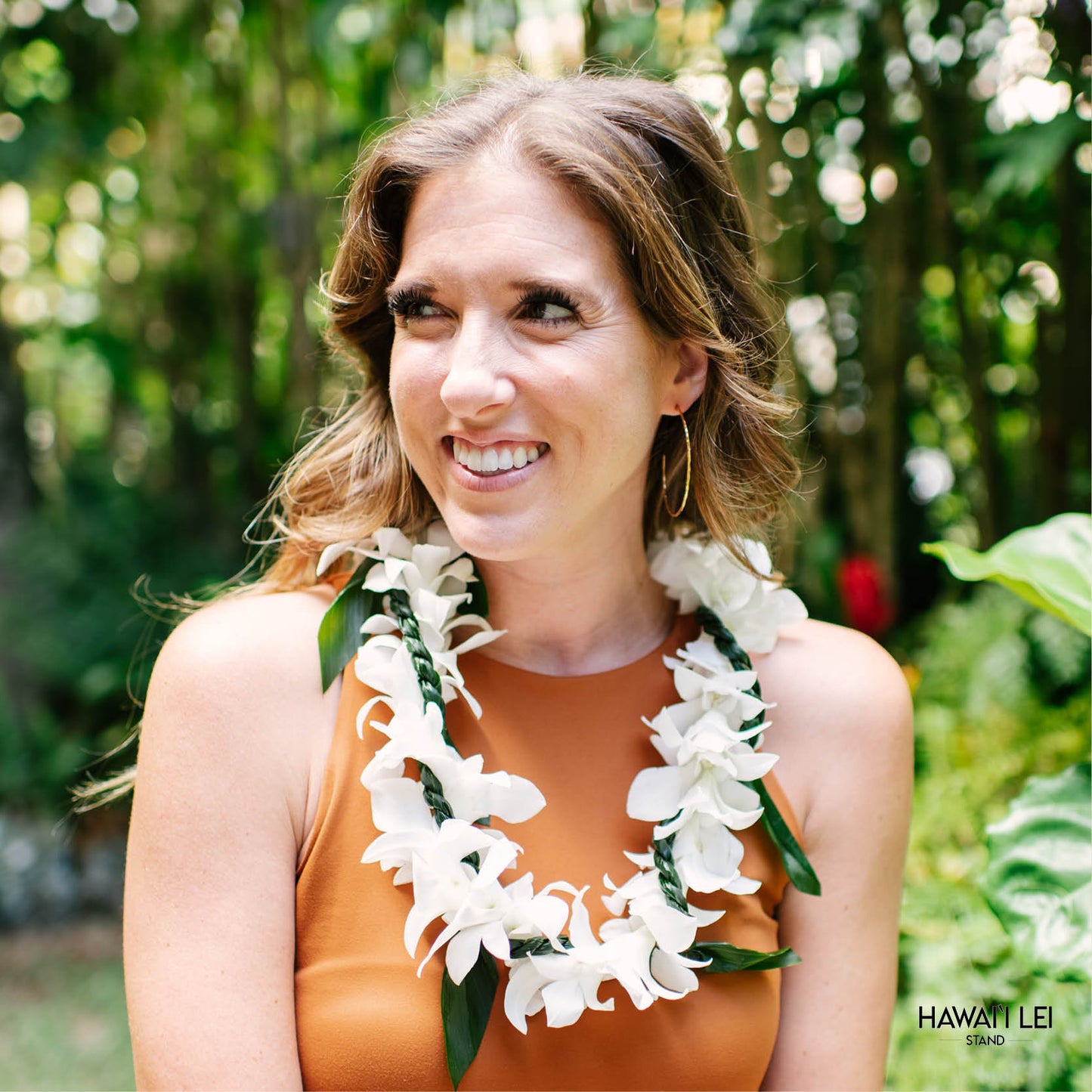 Orchid Wrapped With Ti Leaf Lei