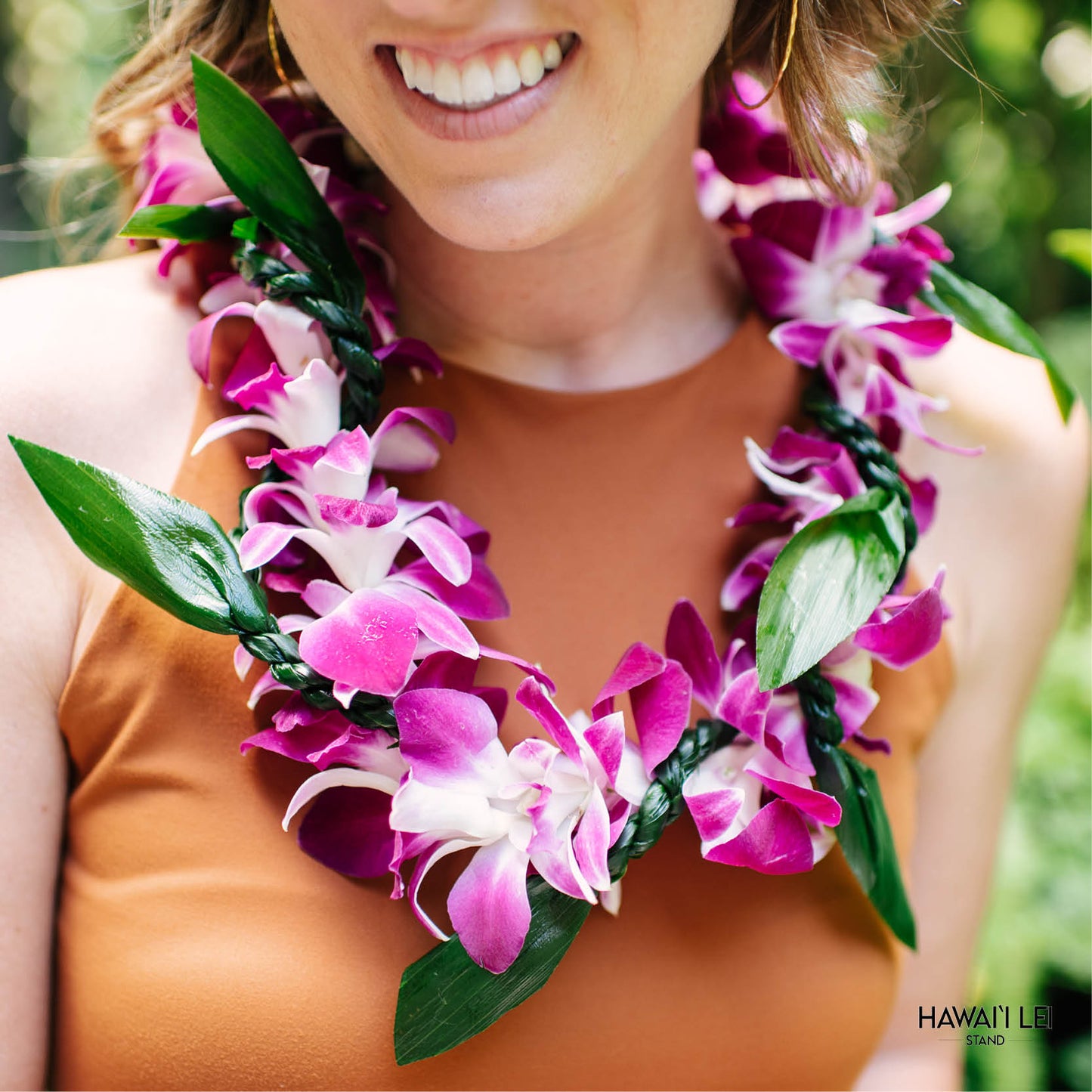 Orchid Wrapped With Ti Leaf Lei (Purple)