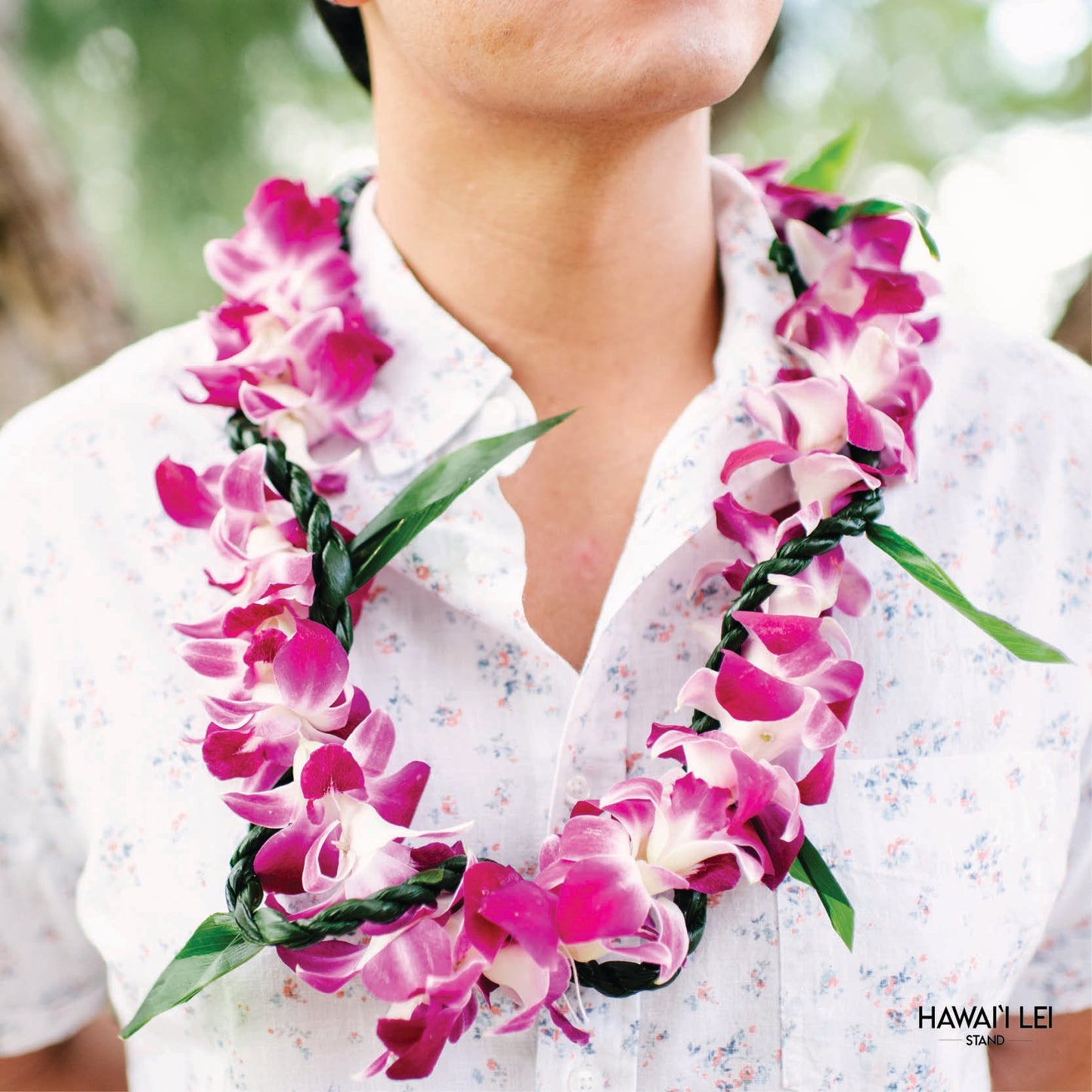 Orchid Wrapped With Ti Leaf Lei (Purple)